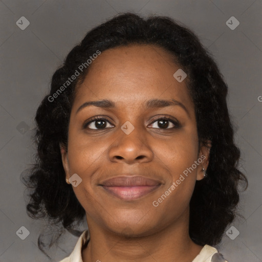 Joyful black young-adult female with medium  brown hair and brown eyes