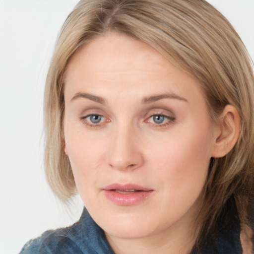 Neutral white young-adult female with medium  brown hair and blue eyes