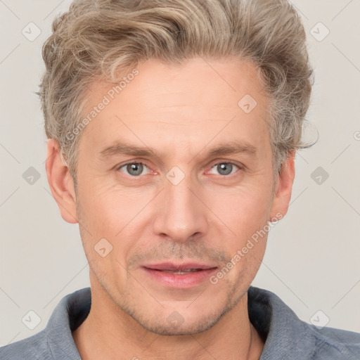 Neutral white adult male with short  brown hair and grey eyes