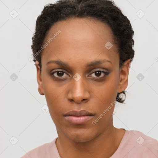 Neutral black young-adult female with short  brown hair and brown eyes