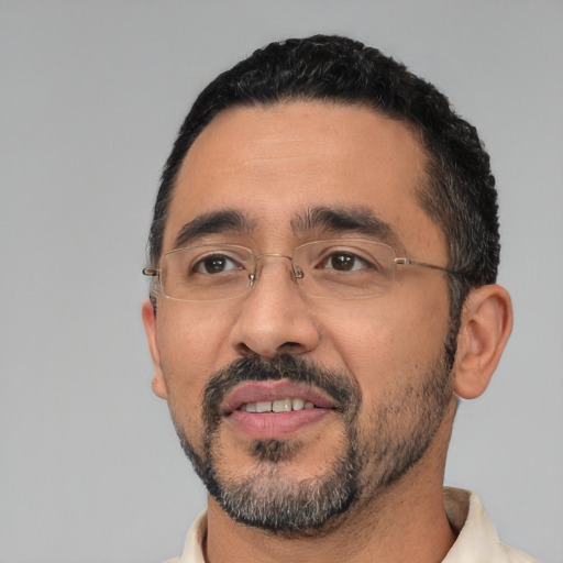 Neutral latino adult male with short  black hair and brown eyes