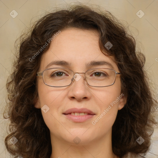 Joyful white adult female with medium  brown hair and green eyes