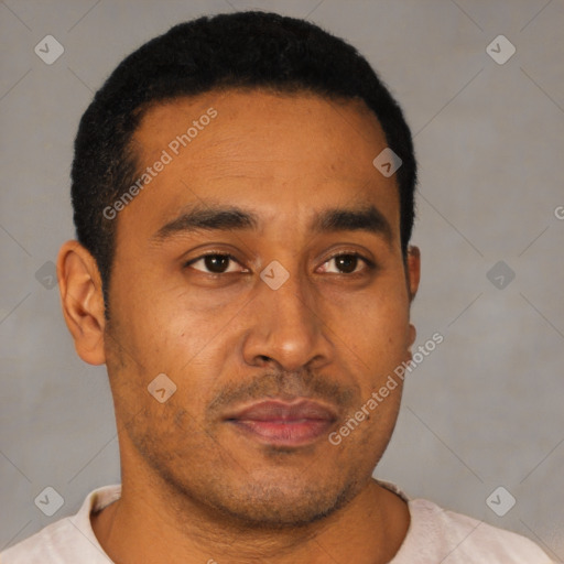 Neutral latino young-adult male with short  brown hair and brown eyes