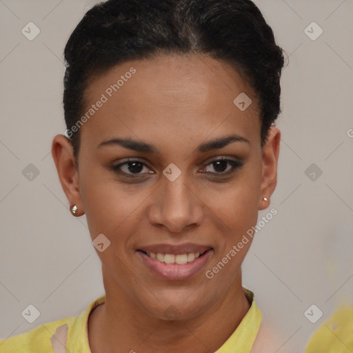 Joyful black young-adult female with short  brown hair and brown eyes