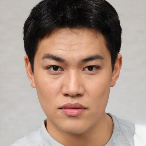 Neutral asian young-adult male with short  black hair and brown eyes