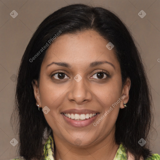 Joyful black young-adult female with medium  brown hair and brown eyes