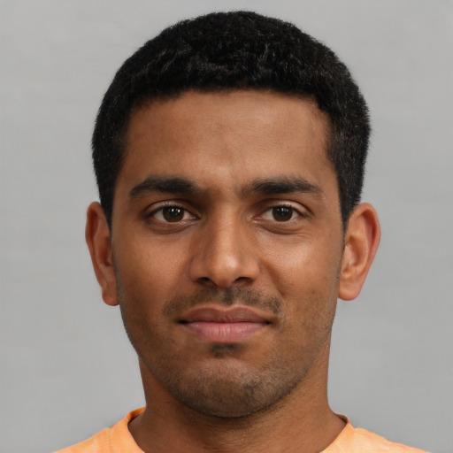 Neutral black young-adult male with short  black hair and brown eyes