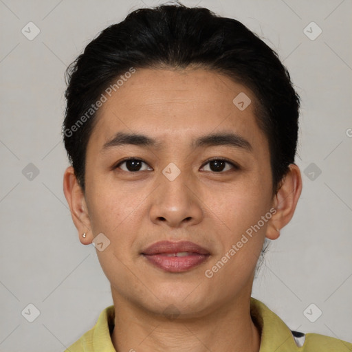 Joyful latino young-adult male with short  black hair and brown eyes