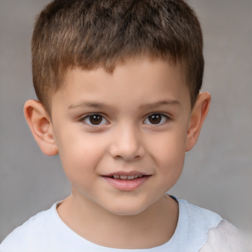 Joyful white child male with short  brown hair and brown eyes