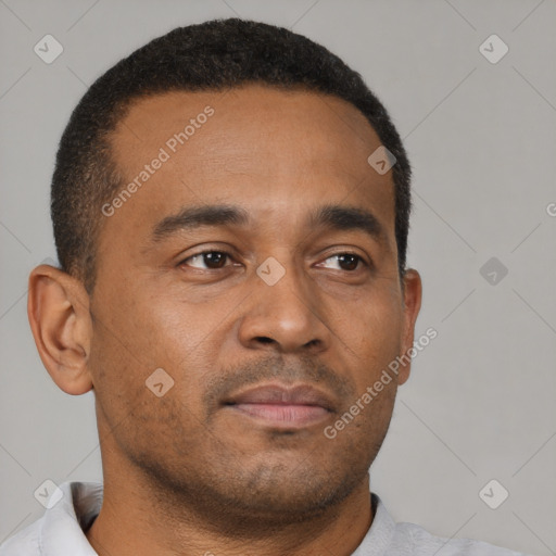 Neutral latino young-adult male with short  brown hair and brown eyes