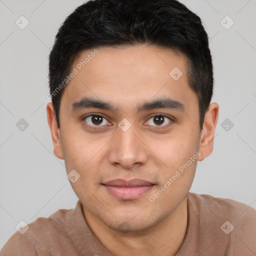 Joyful latino young-adult male with short  black hair and brown eyes