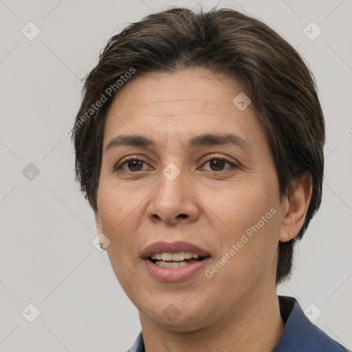 Joyful white adult female with short  brown hair and brown eyes