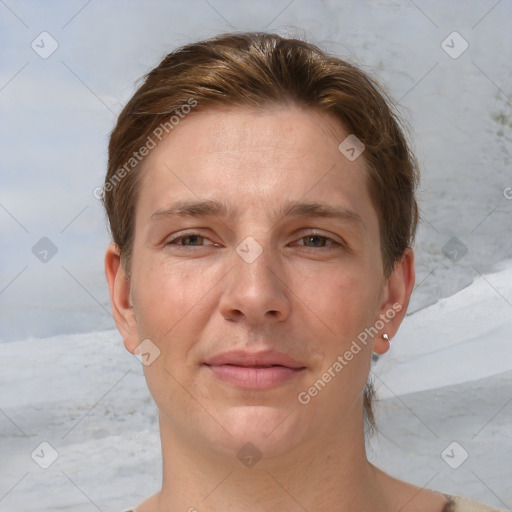 Joyful white adult female with short  brown hair and grey eyes