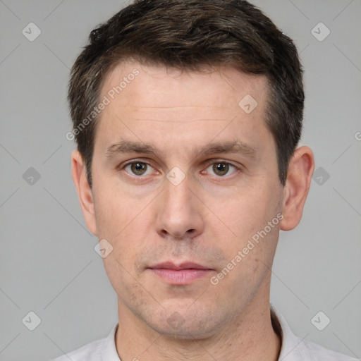 Neutral white adult male with short  brown hair and brown eyes