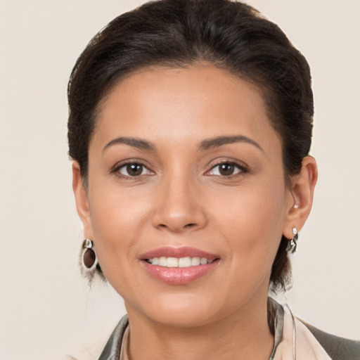 Joyful white young-adult female with medium  brown hair and brown eyes