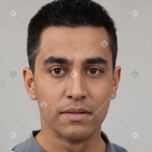 Neutral latino young-adult male with short  black hair and brown eyes