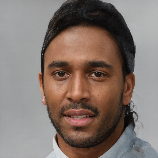 Neutral black young-adult male with short  black hair and brown eyes