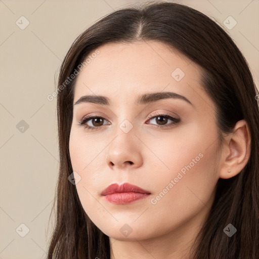 Neutral white young-adult female with long  brown hair and brown eyes