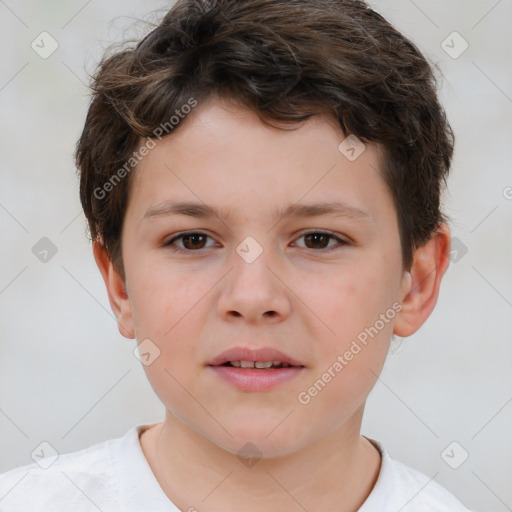 Joyful white child male with short  brown hair and brown eyes