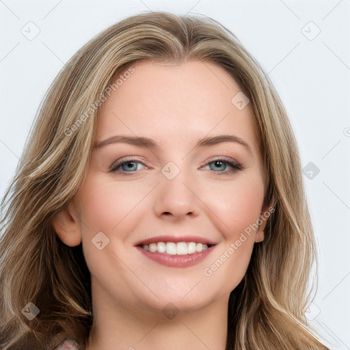 Joyful white young-adult female with long  brown hair and green eyes