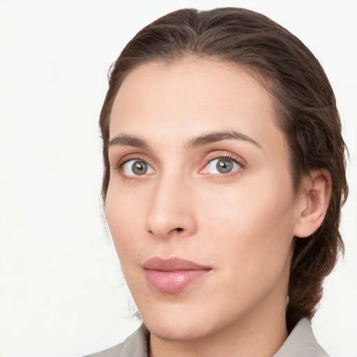 Neutral white young-adult female with medium  brown hair and grey eyes