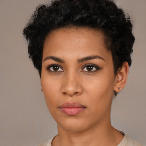 Neutral latino young-adult female with short  black hair and brown eyes