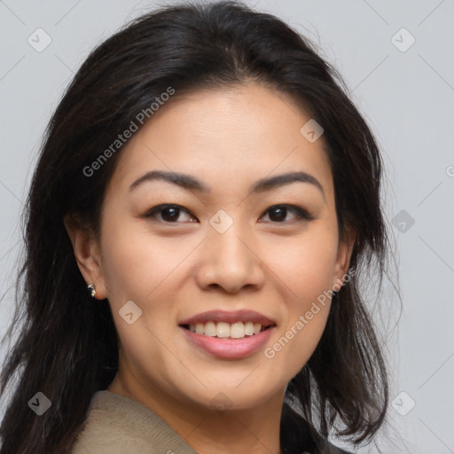 Joyful asian young-adult female with long  brown hair and brown eyes