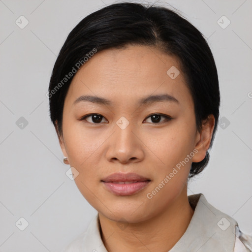 Joyful asian young-adult female with medium  black hair and brown eyes