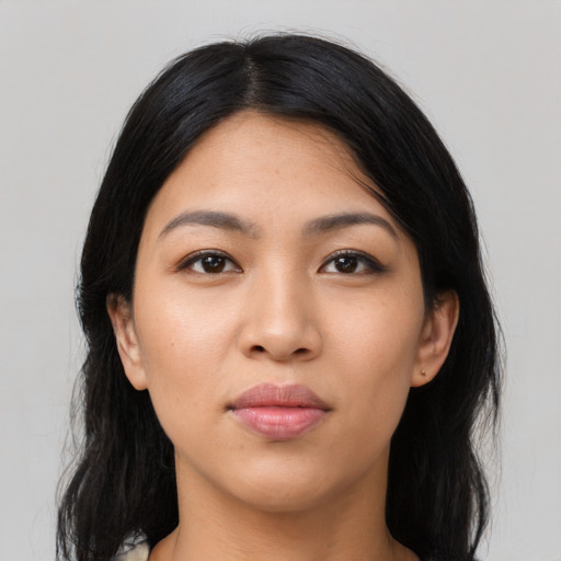 Neutral latino young-adult female with medium  black hair and brown eyes