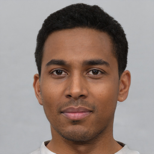 Neutral black young-adult male with short  black hair and brown eyes