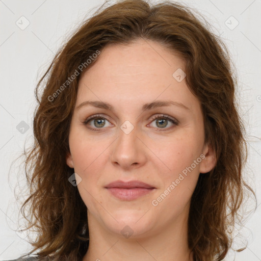 Joyful white young-adult female with medium  brown hair and green eyes