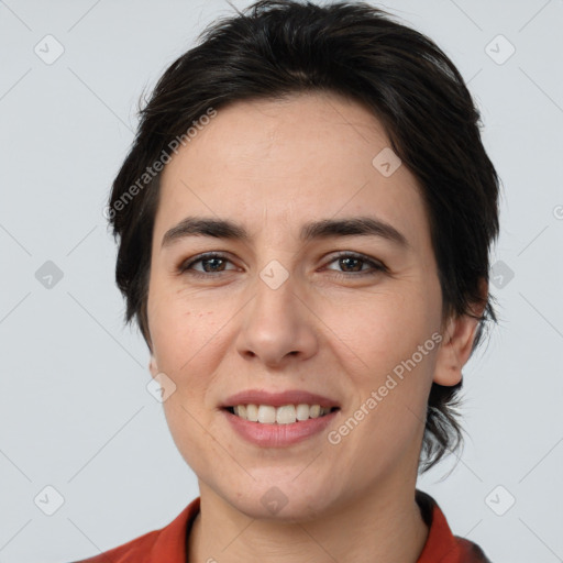 Joyful white young-adult female with medium  brown hair and brown eyes