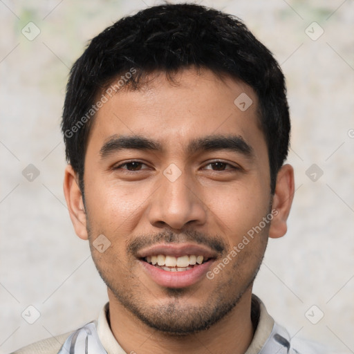 Joyful asian young-adult male with short  black hair and brown eyes