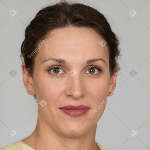 Joyful white adult female with short  brown hair and grey eyes