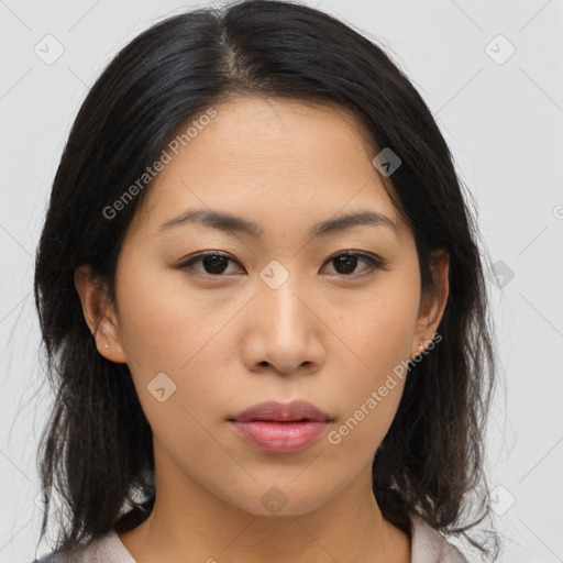 Neutral asian young-adult female with medium  brown hair and brown eyes