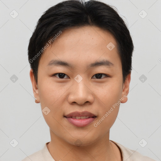 Joyful asian young-adult male with short  brown hair and brown eyes