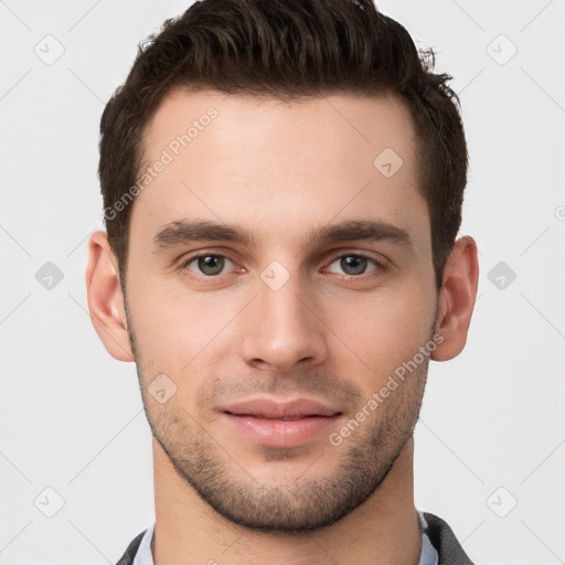 Neutral white young-adult male with short  brown hair and brown eyes