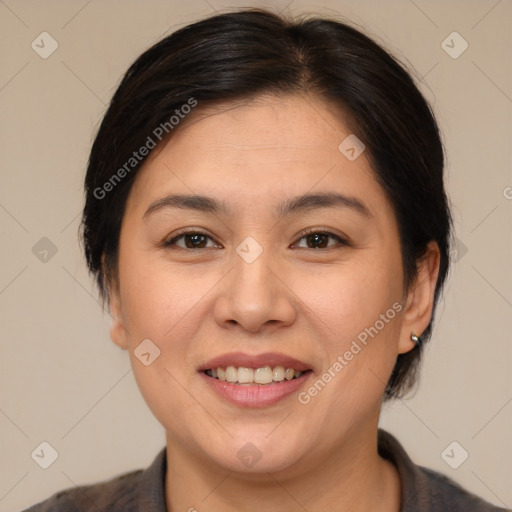 Joyful white adult female with medium  brown hair and brown eyes