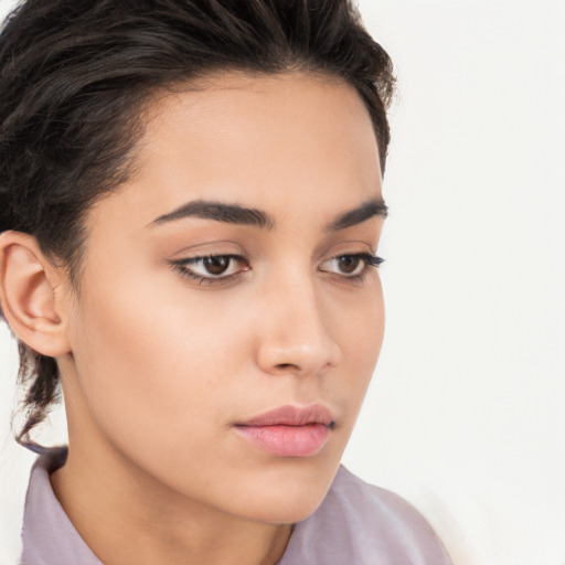 Neutral white young-adult female with medium  brown hair and brown eyes