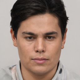 Neutral asian young-adult male with short  brown hair and brown eyes