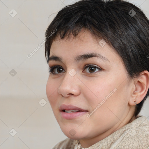 Joyful white young-adult female with short  brown hair and brown eyes