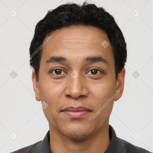 Neutral latino adult male with short  black hair and brown eyes