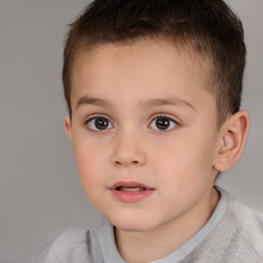 Neutral white child male with short  brown hair and brown eyes