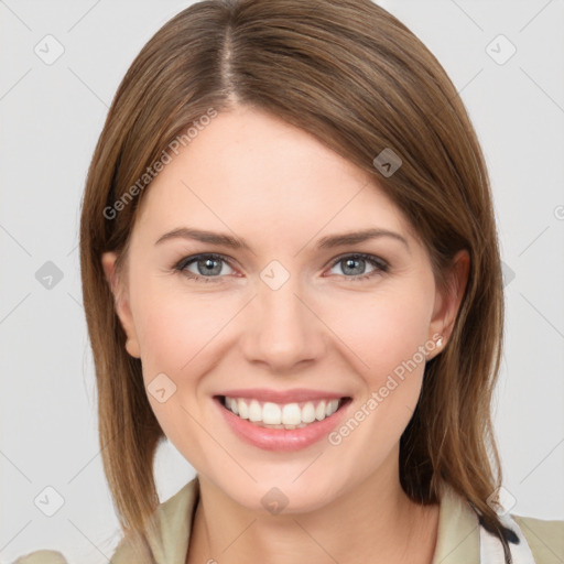 Joyful white young-adult female with medium  brown hair and grey eyes