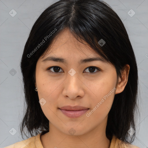 Joyful asian young-adult female with medium  brown hair and brown eyes