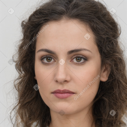 Neutral white young-adult female with long  brown hair and brown eyes