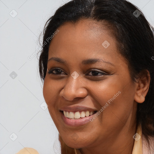 Joyful asian young-adult female with long  brown hair and brown eyes