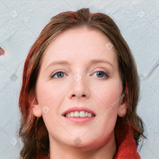 Joyful white young-adult female with medium  brown hair and blue eyes