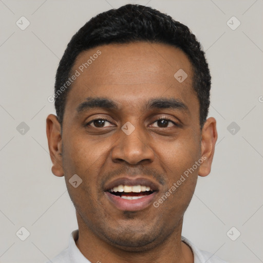 Joyful black young-adult male with short  black hair and brown eyes