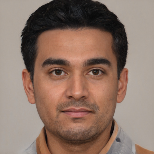 Neutral white young-adult male with short  black hair and brown eyes